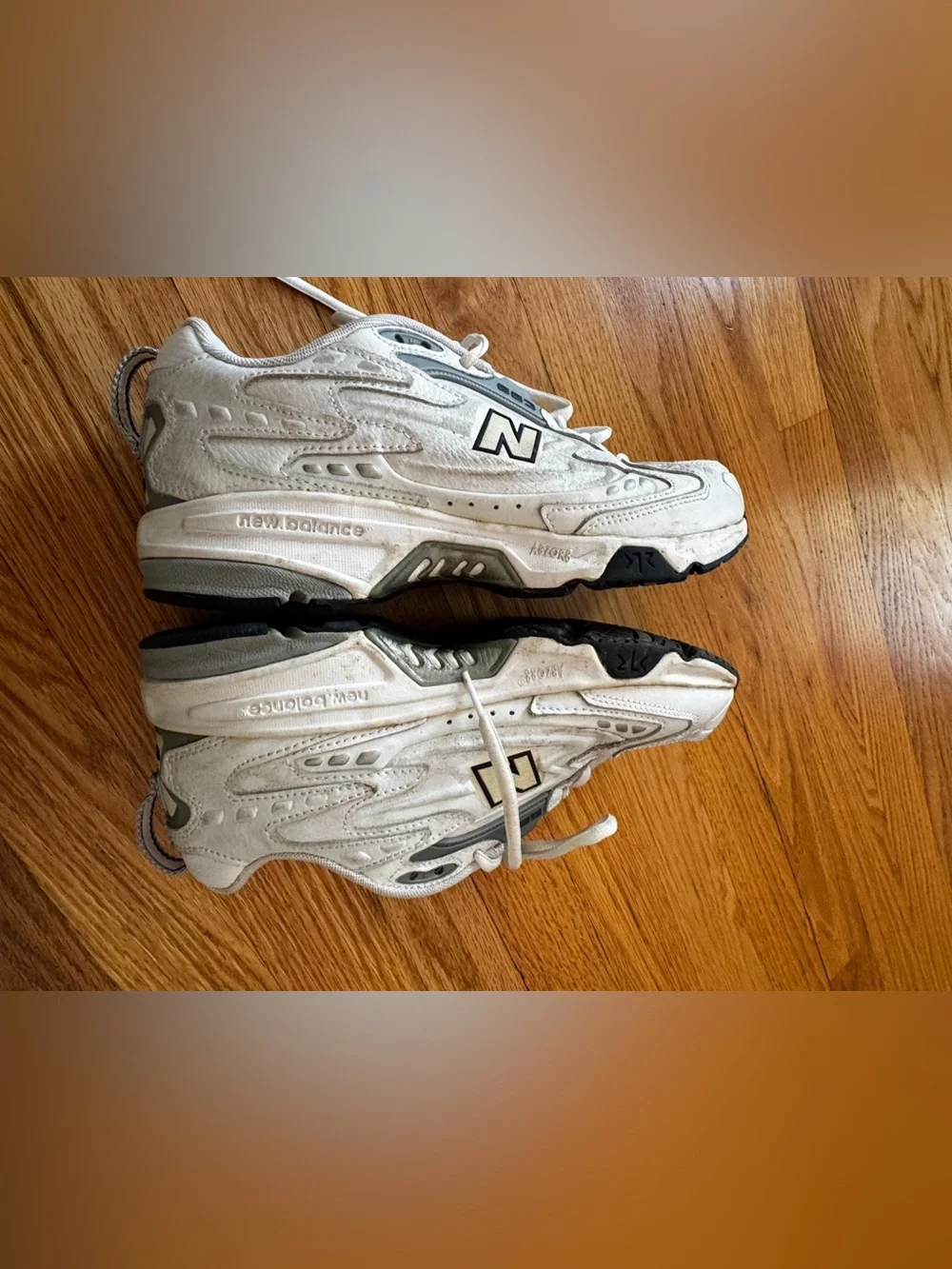 New Balance Men’s White Sneakers with Navy and Gray Accents